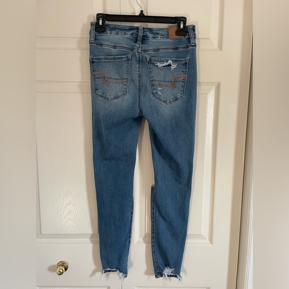 AMERICAN EAGLE BLUE RIPPED JEANS (size 4) - Picture 2 of 8